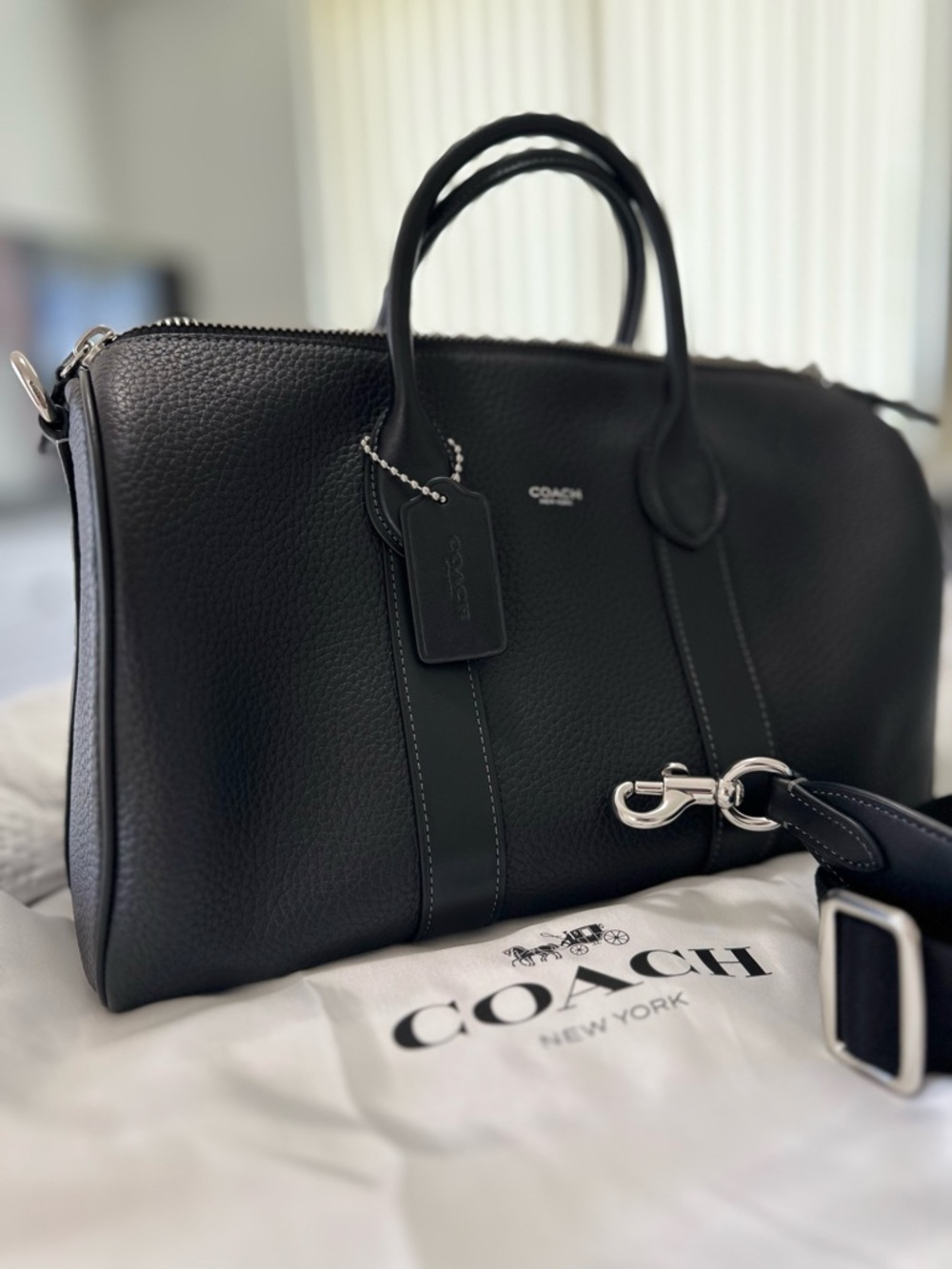 Coach Compass 35 in Black Leather-Like New